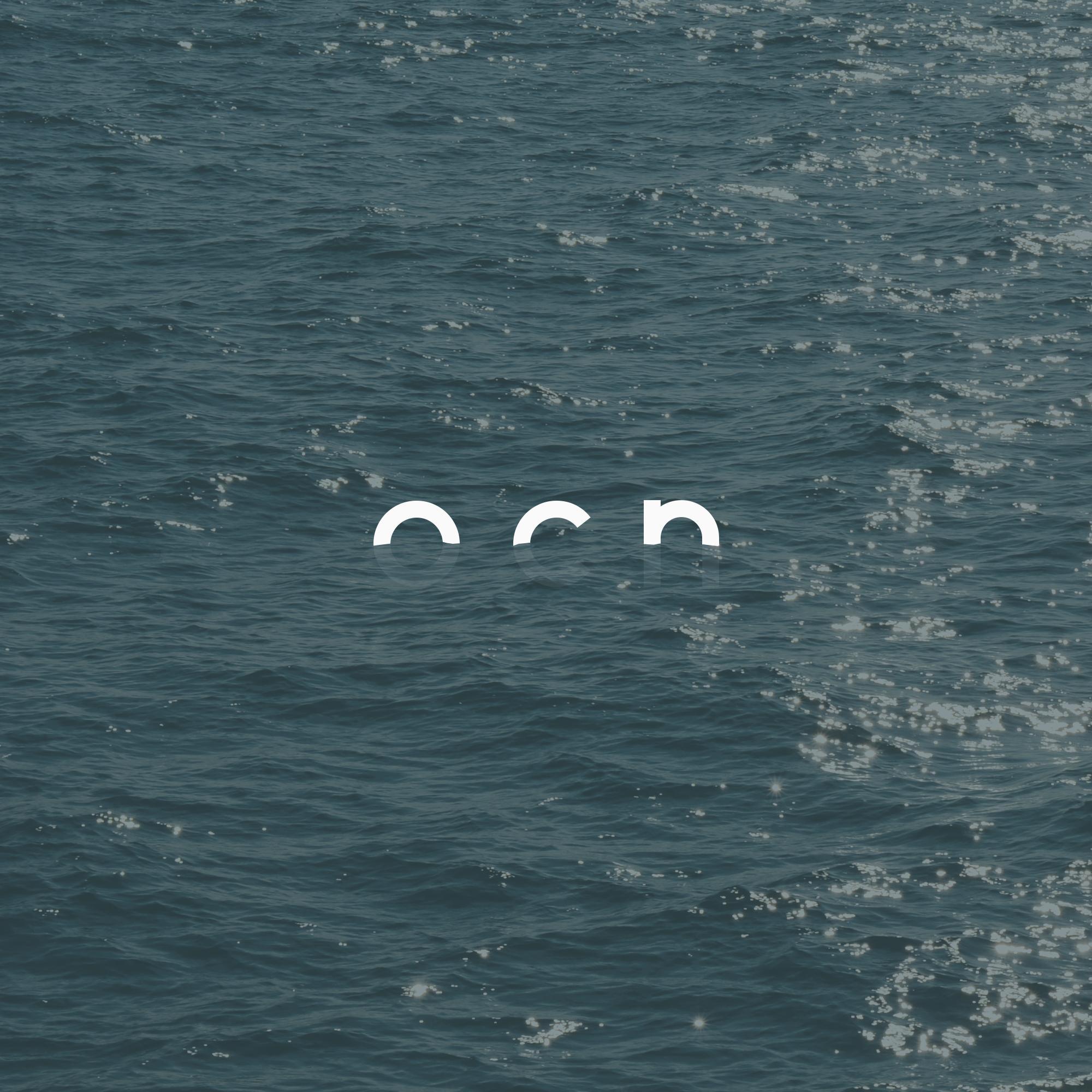 an image of the ocean with the letters 'o', 'c', and 'n' floating in the water