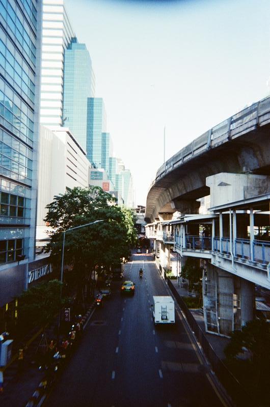 city road headed towards a sky train station