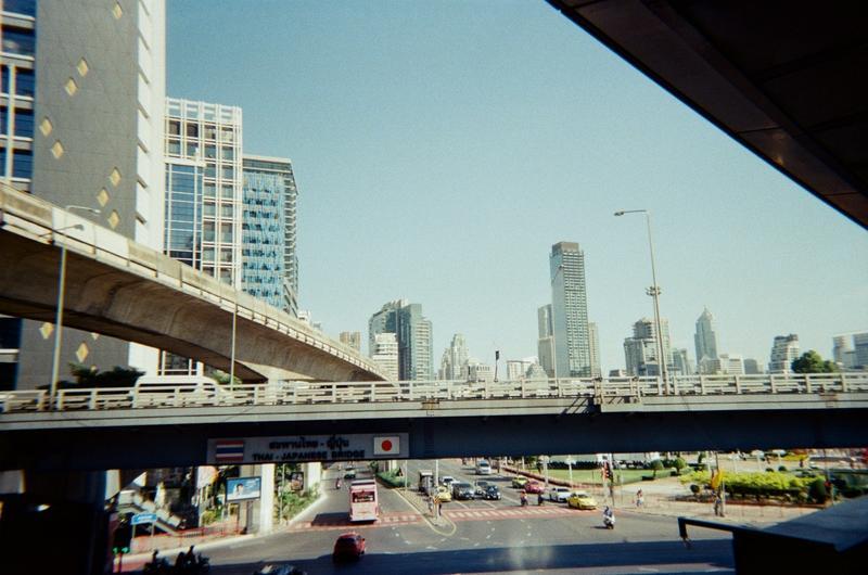 a sky train track over a bridge over an intersection