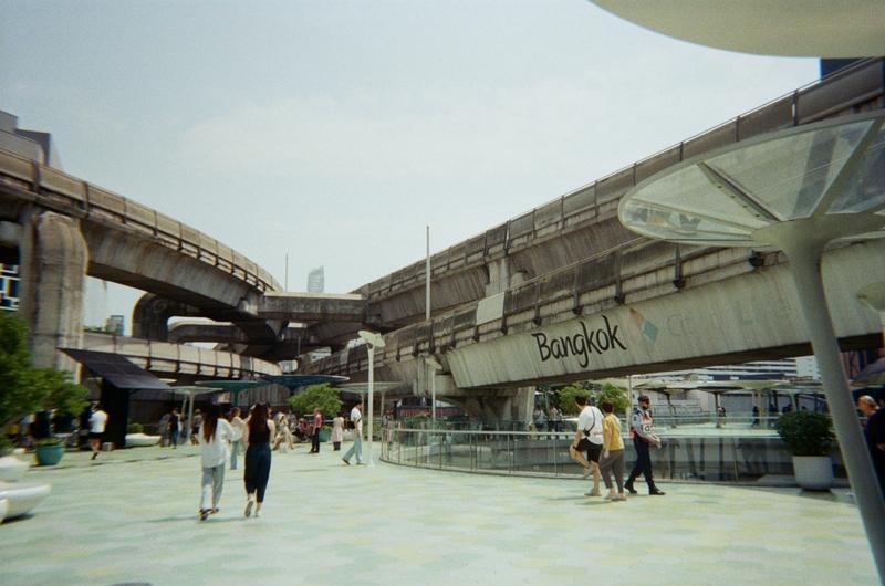 people walking along the OneSiam Skywalk