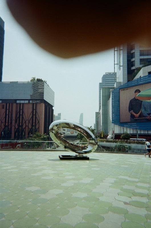 a metal sculpture on the OneSiam Skywalk