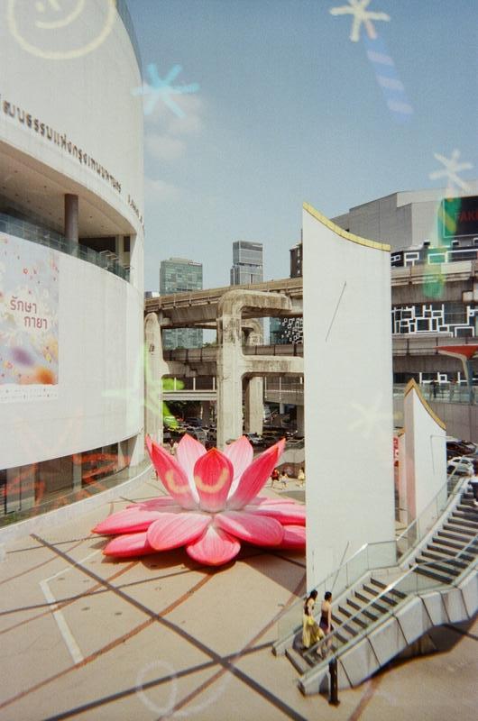 a giant lotus flower sculpture in front of the BACC