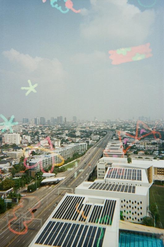 an expressway running through Bangkok's congested landscape