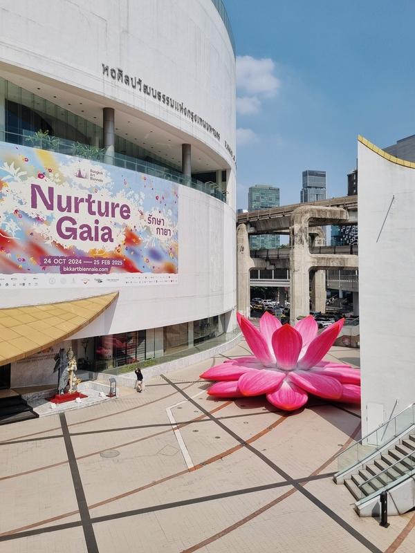 a giant lotus flower sculpture in front of the BACC