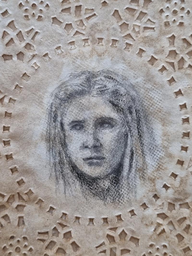 Meggie (Inkheart), graphite on coffee-stained paper doily