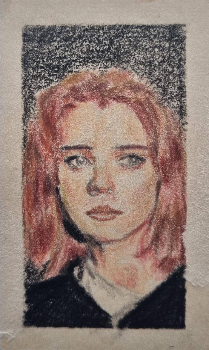 a portrait of a red-haired girl